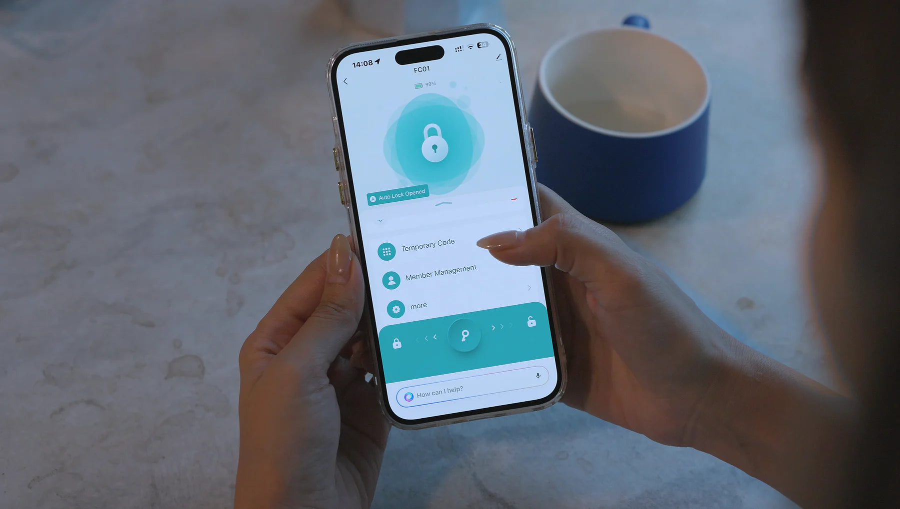 R8 Bluetooth app controls shown on a phone beside a coffee cup